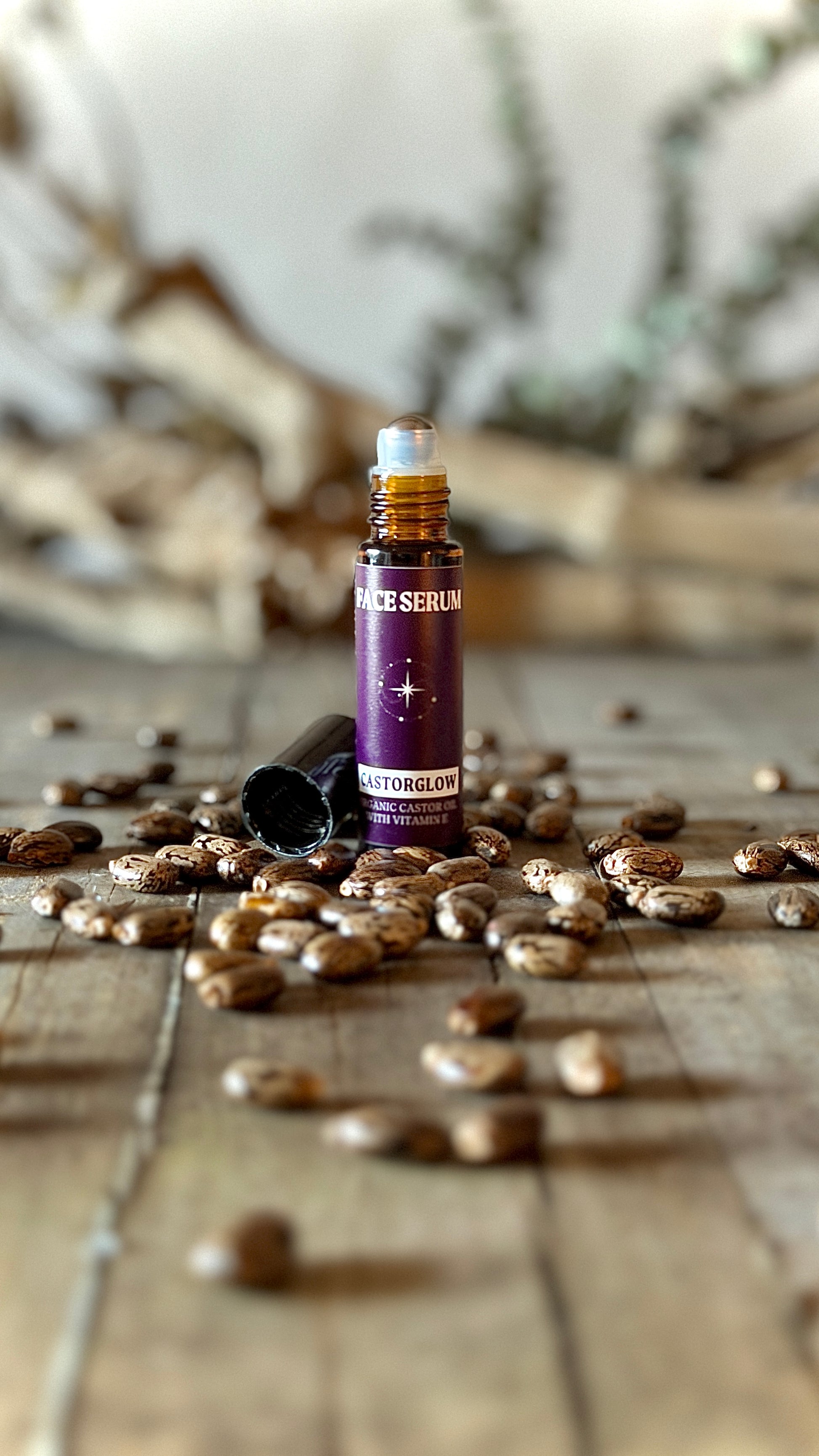 CastorSpell organic castor oil face serum travel roller stainless steel ball glass bottle 10ml true size distance