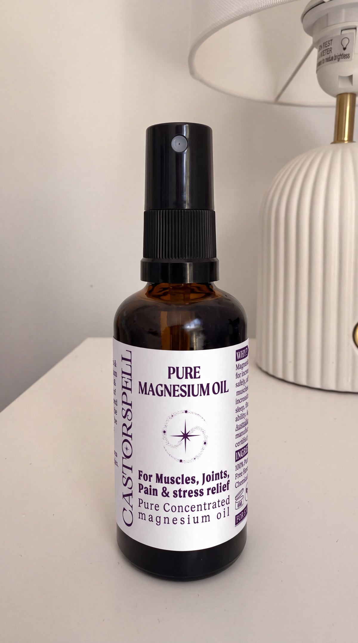A bottle of Castorspell Pure Magnesium Oil 